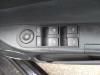 Interruptor de retrovisor de un Opel Tigra 2004