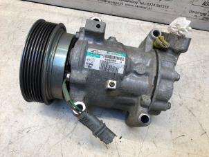 Used Air conditioning pump Renault Clio III (BR/CR) 1.2 16V 75 Price on request offered by N Kossen Autorecycling BV