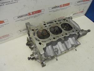 Used Cylinder head Peugeot 107 Price on request offered by N Kossen Autorecycling BV