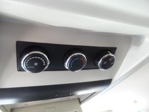 Used Air conditioning control panel Chrysler Voyager Price on request offered by N Kossen Autorecycling BV