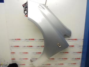 Used Front wing, left Opel Corsa Price on request offered by N Kossen Autorecycling BV