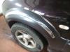 Flared wheel arch from a Ssang Yong Rexton, 2002 2.7 Xdi RX/RJ 270 16V, SUV, Diesel, 2.696cc, 120kW (163pk), 4x4, M665925; EURO4, 2004-08 / 2012-12, GSB1DS; GAR1FS; G0R1FS 2005