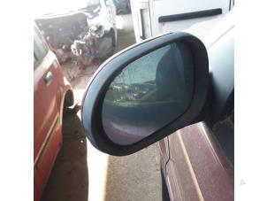 Used Mirror glass, left Mercedes ML-Klasse Price on request offered by N Kossen Autorecycling BV