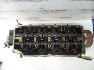 Used Cylinder head Mitsubishi Carisma 1.6i 16V Price on request offered by N Kossen Autorecycling BV