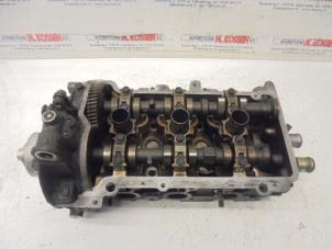 Used Cylinder head Daihatsu Cuore Price on request offered by N Kossen Autorecycling BV