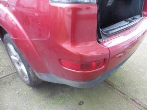 Used Rear bumper corner, left Mitsubishi Outlander Price on request offered by N Kossen Autorecycling BV