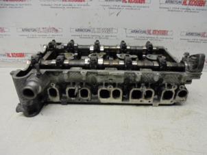 Used Cylinder head Opel Vectra Price on request offered by N Kossen Autorecycling BV