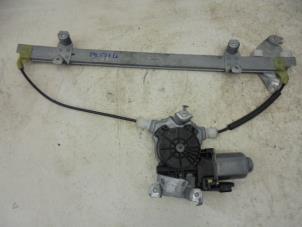 Used Door window motor Nissan Note (E11) 1.6 16V Price on request offered by N Kossen Autorecycling BV