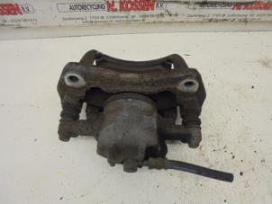 Used Front brake calliper, left Mitsubishi Colt Price on request offered by N Kossen Autorecycling BV