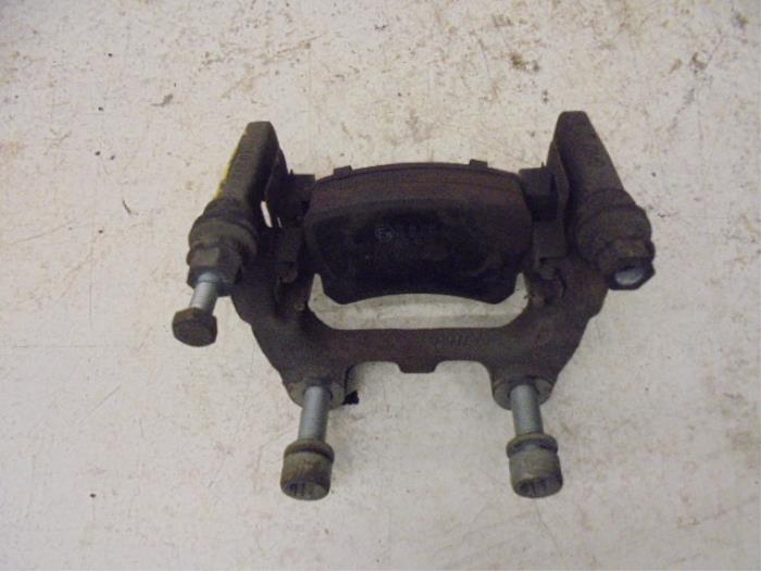 Rear brake calliperholder, left from a Volkswagen Tiguan (5N1/2) 1.4 TSI 16V 2010