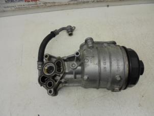 Used Oil filter housing Opel Corsa Price on request offered by N Kossen Autorecycling BV