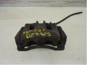 Used Front brake calliper, left Volkswagen Polo III (6N1) 1.6i 75 Price on request offered by N Kossen Autorecycling BV