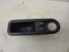 Electric window switch from a Renault Twingo II (CN) 1.5 dCi 90 FAP 2011