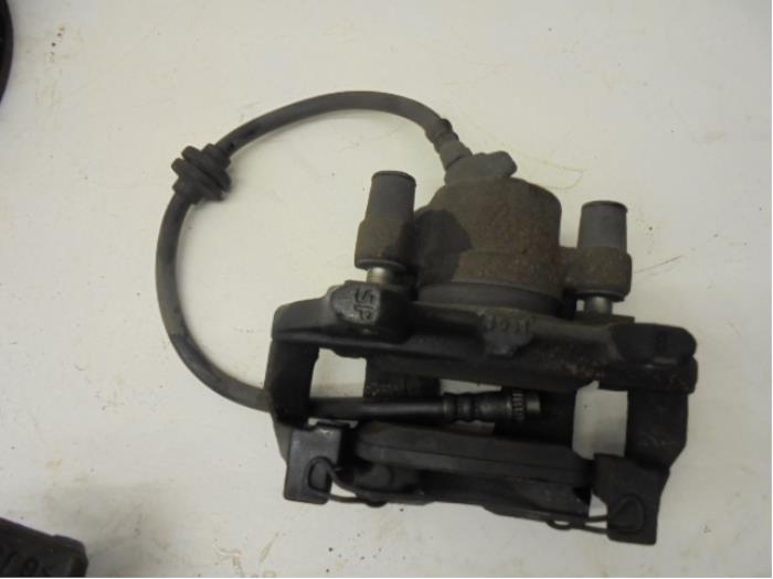 Front brake calliper, left from a Renault Clio IV (5R) 0.9 Energy TCE 90 12V 2014