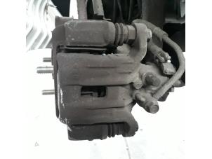 Used Rear brake calliper, left Kia Picanto (TA) 1.0 12V Price on request offered by N Kossen Autorecycling BV