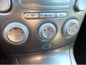 Używane Panel sterowania klimatyzacji Mazda 6 Sportbreak (GY19/89) 1.8i 16V Cena na żądanie oferowane przez N Kossen Autorecycling BV