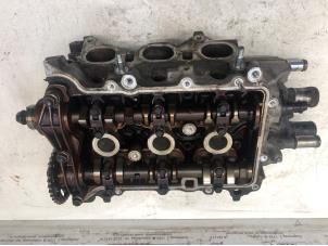 Used Cylinder head Peugeot 107 Price on request offered by N Kossen Autorecycling BV