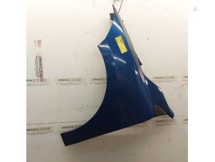 Used Front wing, left Renault Megane Break Price on request offered by N Kossen Autorecycling BV
