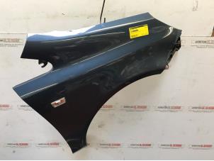 Used Front wing, right Opel Corsa D 1.4 16V Twinport Price on request offered by N Kossen Autorecycling BV
