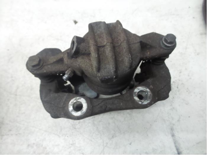 Front brake calliper, left from a Peugeot 208 2014