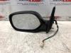 Wing mirror, left from a Toyota Yaris Verso (P2) 1.5 16V 2004