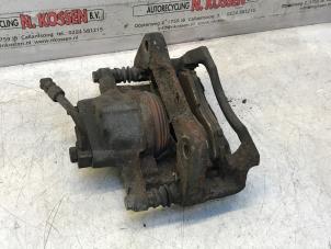 Used Front brake calliper, right Chrysler Voyager Price on request offered by N Kossen Autorecycling BV