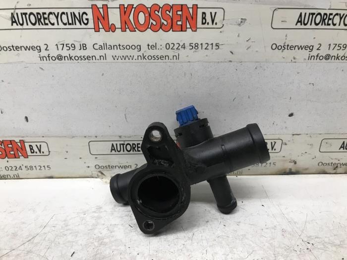 Thermostat housing from a Volkswagen Golf IV (1J1)  1999