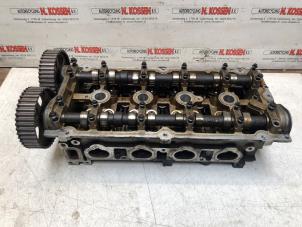 Used Cylinder head Chrysler PT Cruiser Price on request offered by N Kossen Autorecycling BV