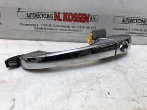 Used Door handle 4-door, front left Chrysler Voyager Price on request offered by N Kossen Autorecycling BV