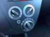 Panel de control de aire acondicionado de un Daihatsu Cuore (L251/271/276), 2003 1.0 12V DVVT, Hatchback, Gasolina, 998cc, 51kW (69pk), FWD, 1KRFE, 2007-04, L271; L276 2008