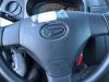 Left airbag (steering wheel) from a Daihatsu Cuore (L251/271/276), 2003 1.0 12V DVVT, Hatchback, Petrol, 998cc, 51kW (69pk), FWD, 1KRFE, 2007-04, L271; L276 2008