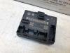 Central door locking module from a Seat Alhambra (7N) 2.0 TDI 16V 2011