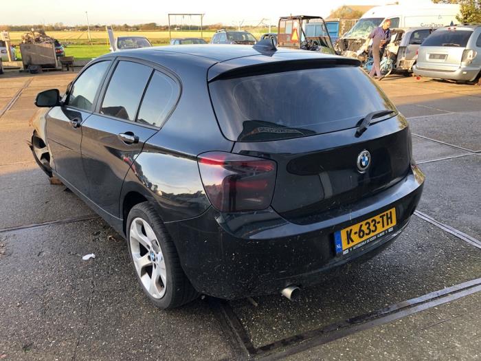 Rear bumper from a BMW 1 serie (F20) 118d 2.0 16V 2014