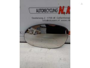 Used Mirror glass, left Chrysler PT Cruiser Cabrio 2.4 16V Price on request offered by N Kossen Autorecycling BV