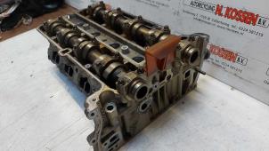 Used Cylinder head Opel Corsa Price on request offered by N Kossen Autorecycling BV