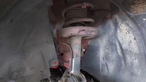 Used Front shock absorber rod, left Opel Corsa D 1.4 16V Twinport Price on request offered by N Kossen Autorecycling BV