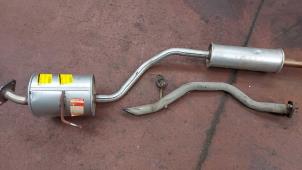 Used Exhaust (complete) Daihatsu Cuore (L251/271/276) 1.0 12V DVVT Price on request offered by N Kossen Autorecycling BV