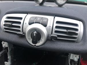 Used Air conditioning control panel Smart Fortwo Price on request offered by N Kossen Autorecycling BV