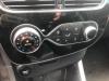 Panneau climatronic d'un Renault Clio IV Estate/Grandtour (7R) 0.9 Energy TCE 90 12V 2016