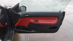 Usagé Revêtement portière haut 2portes droite Peugeot 206 CC (2D) 1.6 16V Prix sur demande proposé par N Kossen Autorecycling BV