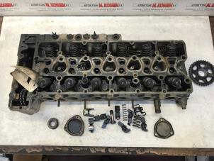 Used Cylinder head Mercedes W126 Price on request offered by N Kossen Autorecycling BV