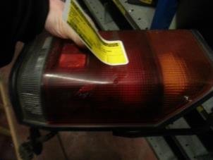 Used Taillight, right Mazda B2000 Price on request offered by N Kossen Autorecycling BV