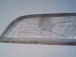 Used Headlight lens, left Volvo V40 (VW) 1.8 16V Price on request offered by N Kossen Autorecycling BV