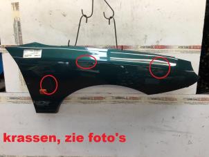 Usados Protector derecha delante MG MGF 1.8i 16V Precio de solicitud ofrecido por N Kossen Autorecycling BV