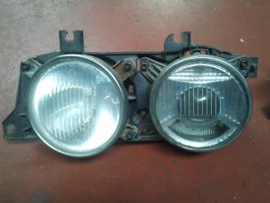 Used Headlight, left BMW 7 serie (E32) 730i,iL Price on request offered by N Kossen Autorecycling BV