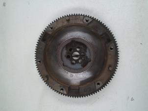 Used Flywheel Daihatsu Cuore (L251/271/276) 1.0 12V Price on request offered by N Kossen Autorecycling BV