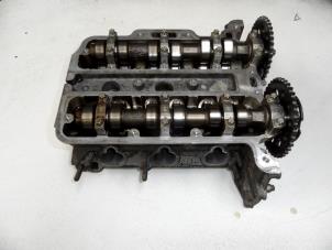 Used Cylinder head Opel Corsa B (73/78/79) 1.0i 12V Price on request offered by N Kossen Autorecycling BV