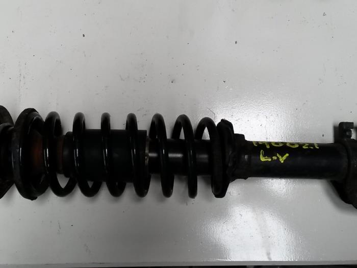 Front shock absorber rod, left from a Opel Agila (A) 1.2 16V Twin Port 2005