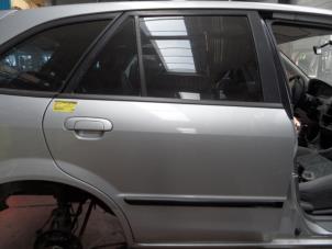 Used Rear door 4-door, right Mazda 323 Fastbreak (BJ14) 1.5 LX,GLX 16V Price on request offered by N Kossen Autorecycling BV
