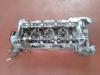 Cylinder head from a Nissan Primera (P12) 1.8 16V 2006